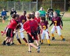 Kids playing football