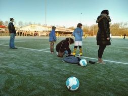 schoolchildren play football