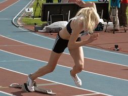 athletics fast girl on a race