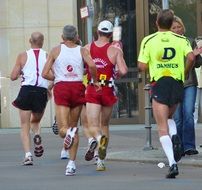 jogger among city street