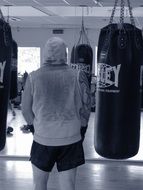 Black and white photo of a boxer in the hall