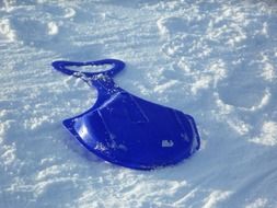 blue plastic slide, porutscher on snow
