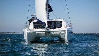 sailing Catamaran ship in the water