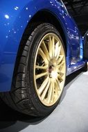 tires and wheels on a sports car Subaru