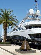 luxury white yacht on the promenade of montenegro