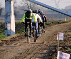 sport Cycling men on a road