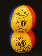 colored balls with painted faces