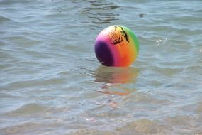 colorful ball on the water