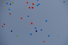 many colorful balloons in the sky
