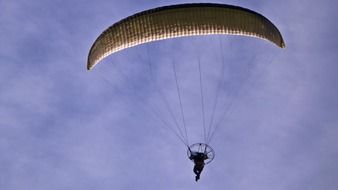 parachute sky sports sky diver in the sky with white clouds