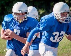 football players in blue t-shirts