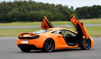 Gull wings of orange and black McClaren