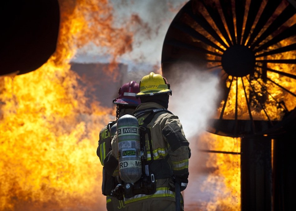 firefighters are in front of big fire