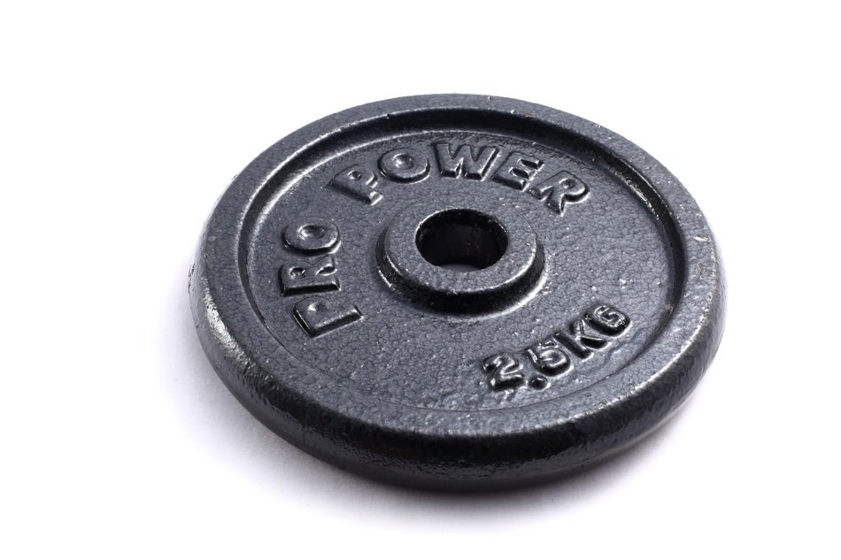 Black weight disc on a white background