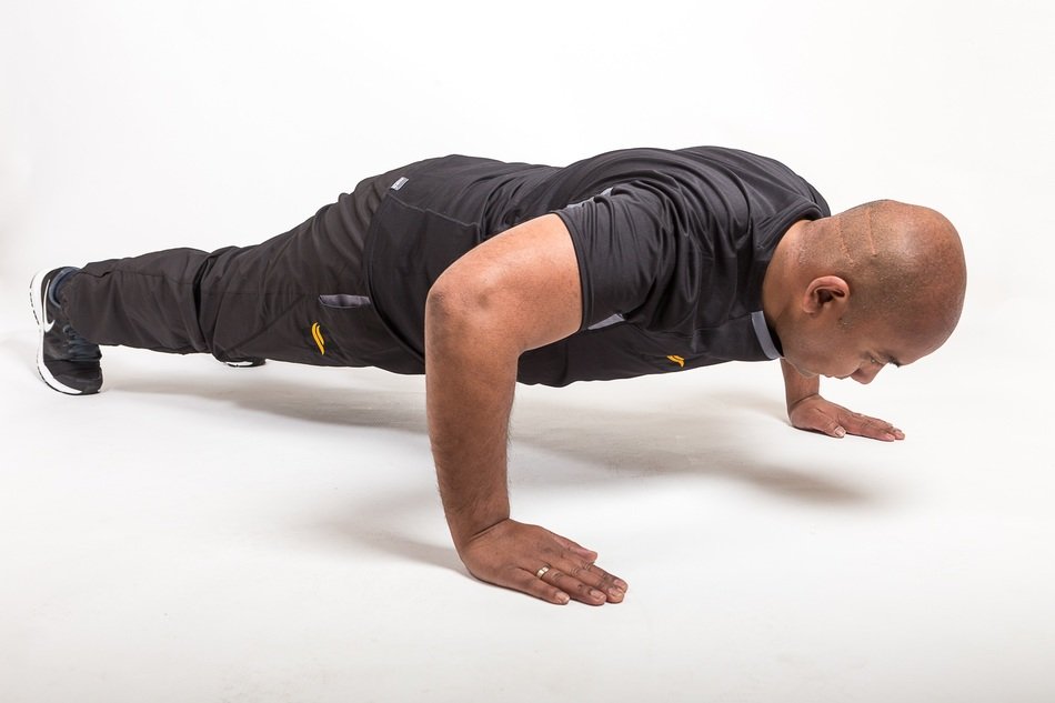 fitness trainer wrung out from the floor