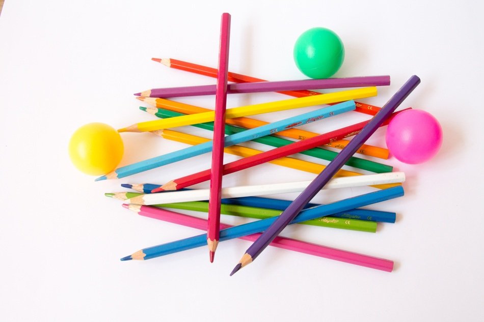 color pencils and color balls