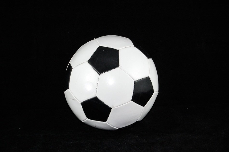 football ball on black background