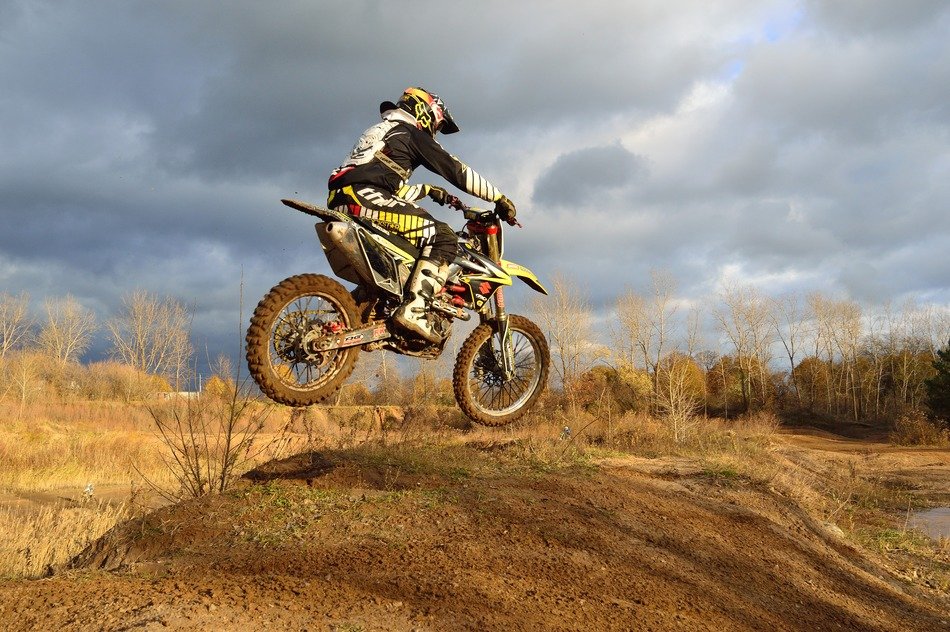 motorcyclist on autumn competition
