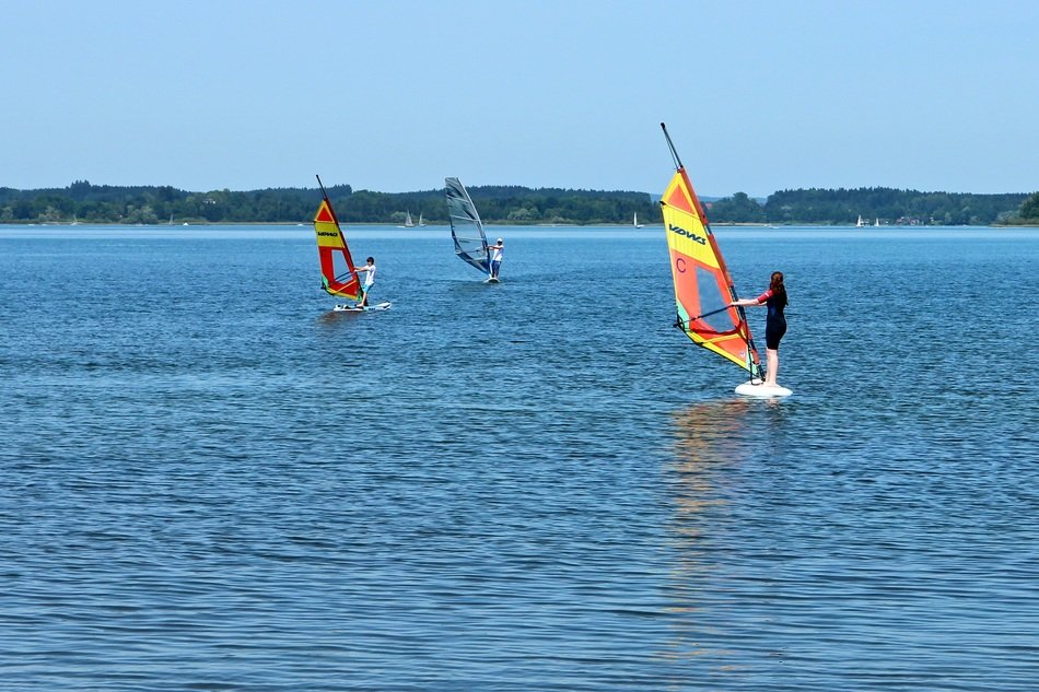 windsurfing with sails on the sea