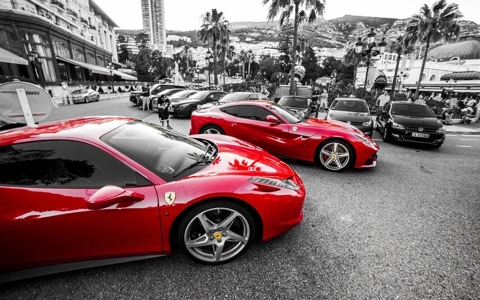 red ferrari in monochrome image