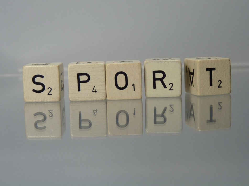 scrabble cubes on a mirror table