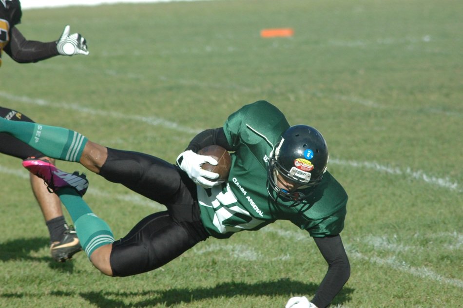 player falls on the field during american football