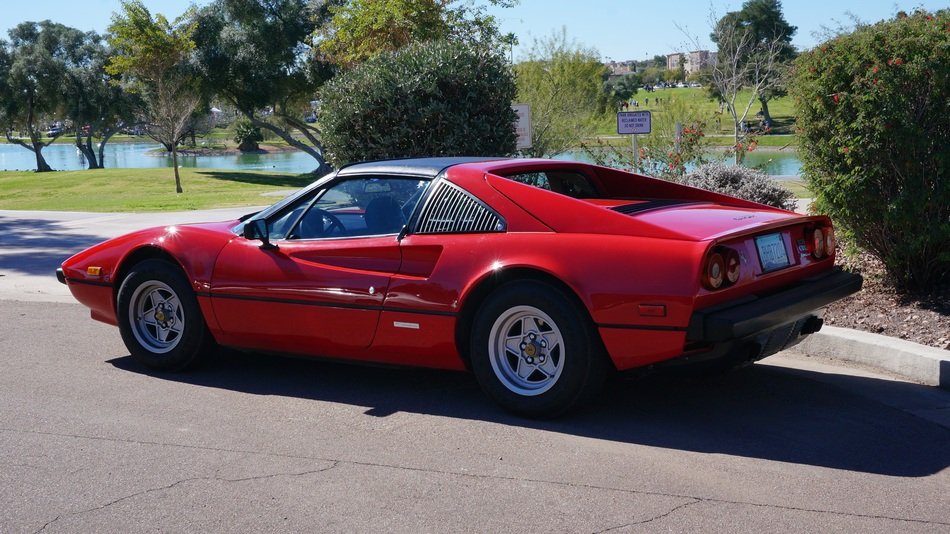 Ferrari on the street under the bright sun