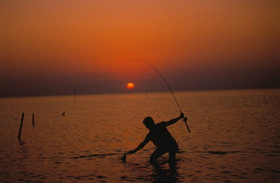 picture of the fisherman at the sunset
