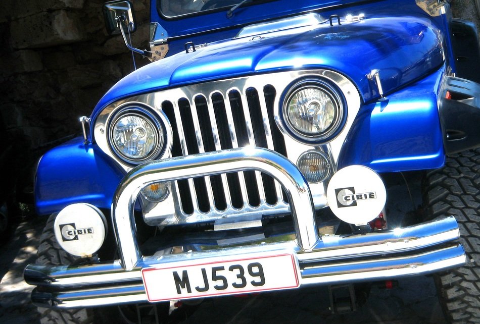 front of the jeep with flashlights