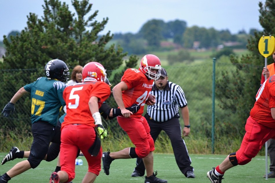 Youth game of American Football on the pitch