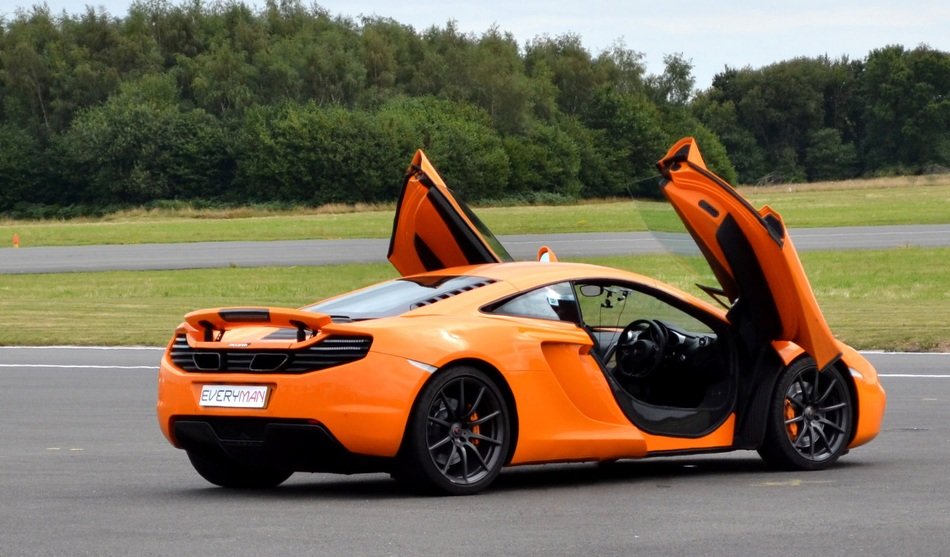 Gull wings of orange and black McClaren