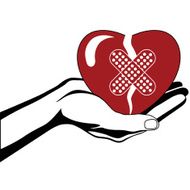 Hand Holding Broken Heart