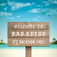 Tropical Beach with Wooden Sign