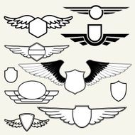 Insignias or Logotypes with wings set on white background
