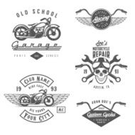 Set of vintage motorcycle labels badges and design elements