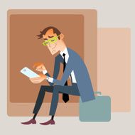 Businessman traveler sits on the bag and reads smartphone