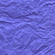 Background of crumpled paper in violet color