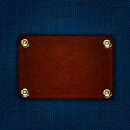 leather label with rivets on denim jeans N2