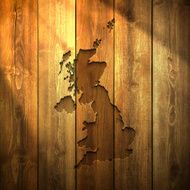 United Kingdom Map on lit Wooden Background