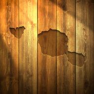 Tahiti - Polynesia Map on lit Wooden Background