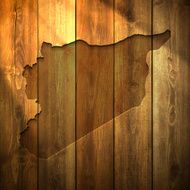 Syria Map on lit Wooden Background