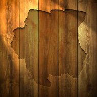 Suriname Map on lit Wooden Background