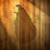 Sri Lanka Map on lit Wooden Background