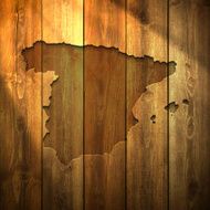 Spain Map on lit Wooden Background
