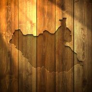 South Sudan Map on lit Wooden Background