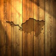 Sint Maarten Map on lit Wooden Background