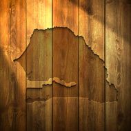 Senegal Map on lit Wooden Background