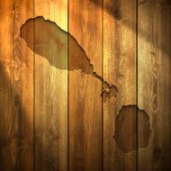 Saint Kitts and Nevis Map on lit Wooden Background
