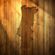 Portugal Map on lit Wooden Background