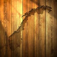 Norway Map on lit Wooden Background